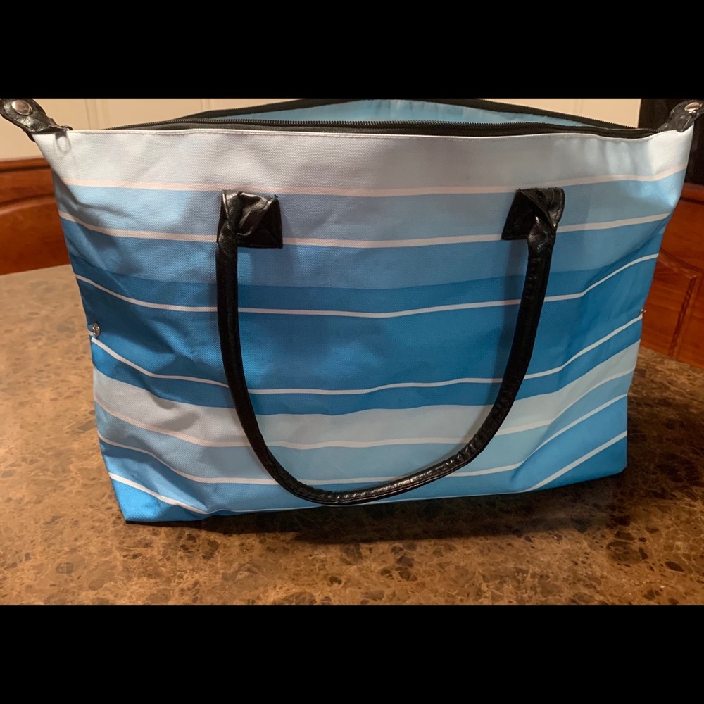 One of  Yik Fung  Tote Handbag